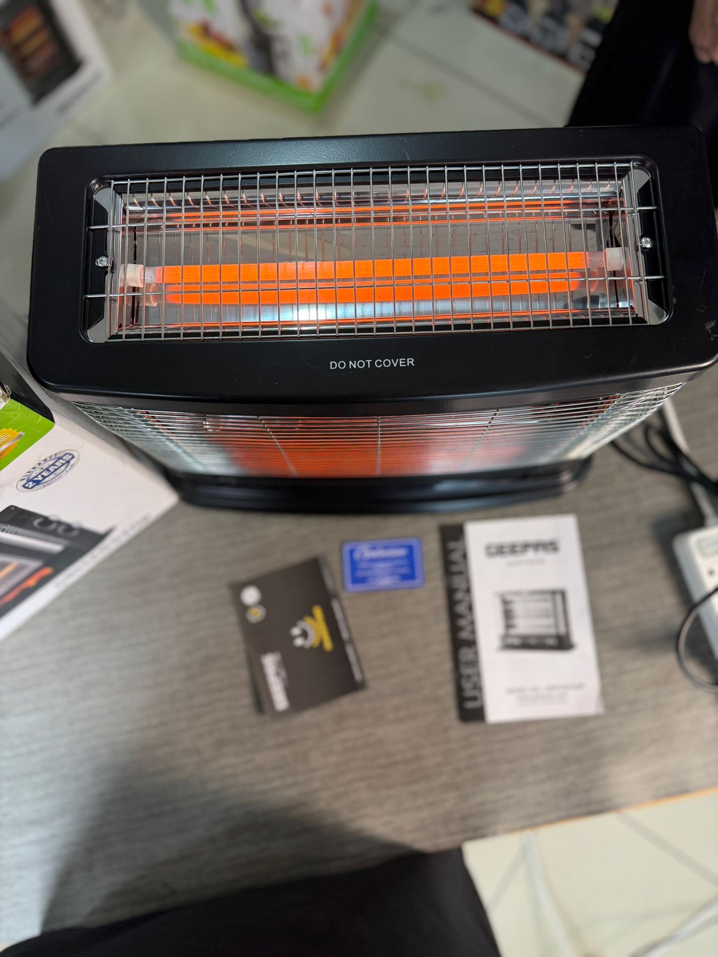 Geepas Flame Rod Heater GRH28510P – 1500W Fireplace-Style Room Heater