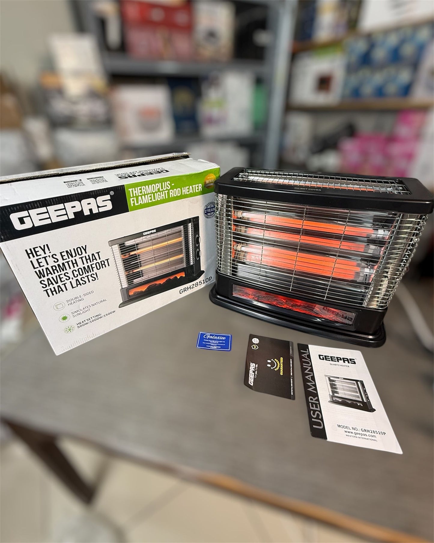 Geepas Flame Rod Heater GRH28510P – 1500W Fireplace-Style Room Heater