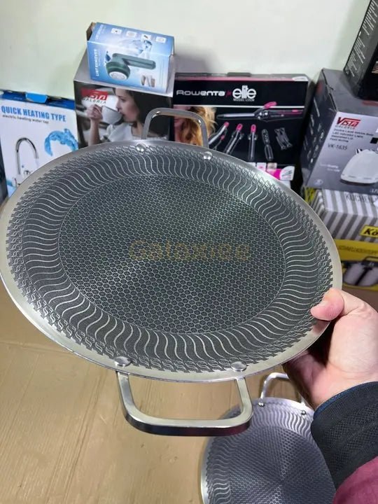Germany lot honeycomb lesser coating tawa - Buy Online Pakistan | Galaxiee.com
