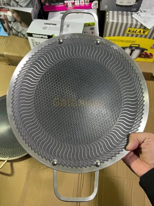 Germany lot honeycomb lesser coating tawa - Buy Online Pakistan | Galaxiee.com